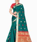 Dark green woven silk blend saree with blouse