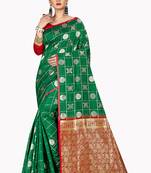 Green woven silk blend saree with blouse