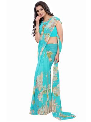 Aqua blue printed georgette saree with blouse 3
