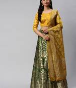Green woven art silk semi stitched lehenga