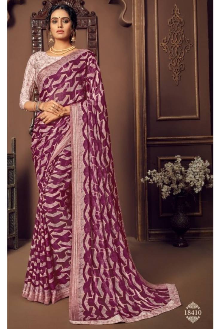 Heavy embroidered Faux Georgette saree with blouse piece