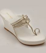 White Laser Cut Faux Leather Kolhapuri Wedges For Women By Trends & Trades 