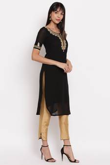 Black georgette hand embroidered kurti paired with beige silk trouser