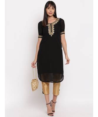 Black georgette hand embroidered kurti paired with beige silk trouser 3