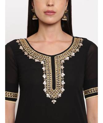 Black georgette hand embroidered kurti paired with beige silk trouser 4