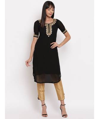 Black georgette hand embroidered kurti paired with beige silk trouser 6