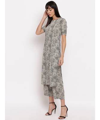 Crepe animal print kurti paired with matching trousers 2
