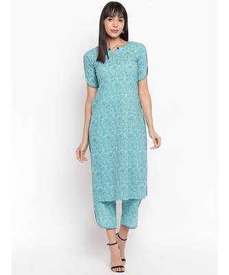 Light blue printed kurti with cut sleeves paired with matching trousers 1