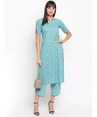 Light blue printed kurti with cut sleeves paired with matching trousers 5