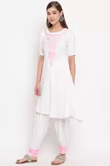 White chikankari a-line  kurti with pink thread work paired with designer salwars