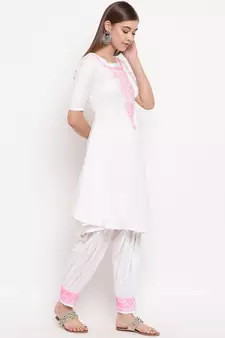 White chikankari a-line  kurti with pink thread work paired with designer salwars