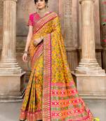 Yellow woven pure silk saree with blouse