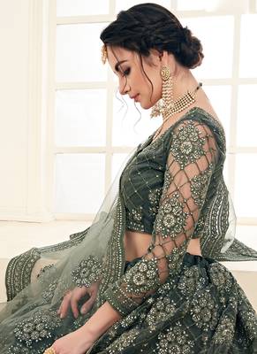 Green embroidered net semi stitched lehenga 4
