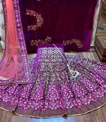 Purple embroidered velvet semi stitched lehenga