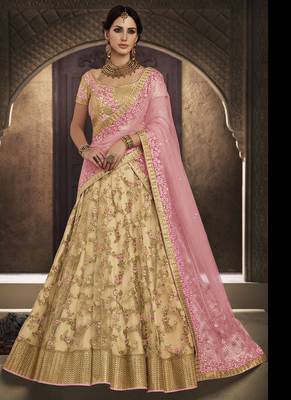 Golden embroidered net semi stitched lehenga 1