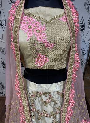 Golden embroidered net semi stitched lehenga 2