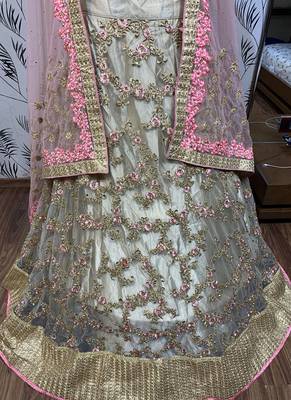 Golden embroidered net semi stitched lehenga 3