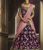 Purple embroidered velvet semi stitched lehenga