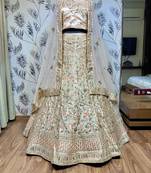 Peach embroidered satin semi stitched lehenga