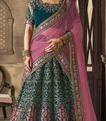 Green embroidered velvet semi stitched lehenga