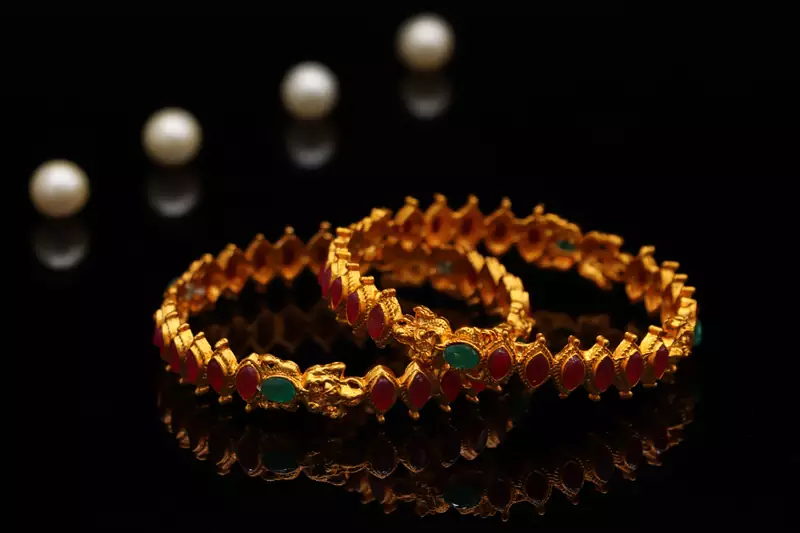Gold Plated Stome Studded Laxmi bangle Set Of 2