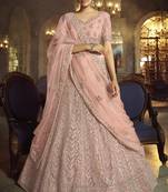 Dazzling Peach Dori Embroidered Net Fabric Semi Stitched Wedding Lehenga