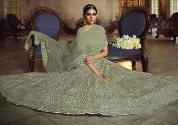 Alluring Green Dori Embroidered Net Fabric Semi Stitched Party wear Lehenga choli 4