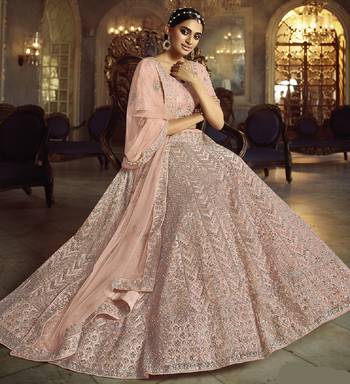 Dazzling Peach Dori Embroidered Net Fabric Semi Stitched Wedding Lehenga 4
