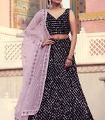 Delightful Black Fur Imported Fabric and Purple Color Sequin Embroidered Bridal Lehenga