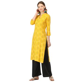 Yellow printed rayon kurtas-and-kurtis 3