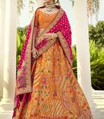 Orange embroidered jacquard semi stitched lehenga