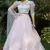 Pink metallic foil printed net Semi Stitched bridal lehenga