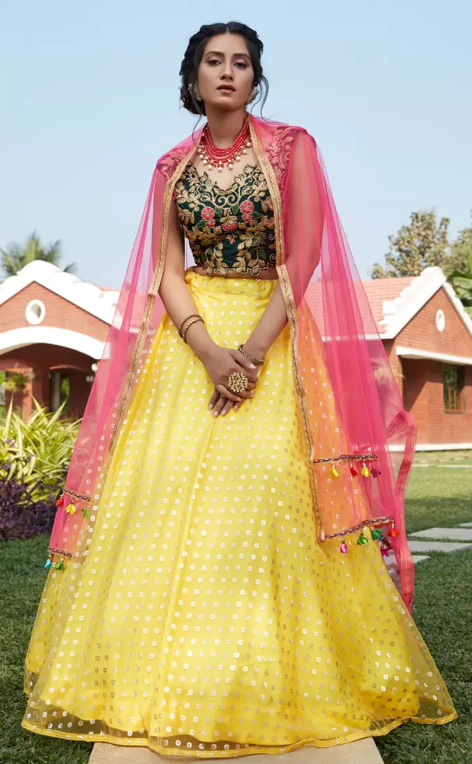 Yellow metallic foil printed net Semi Stitched bridal lehenga