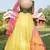 Yellow metallic foil printed net Semi Stitched bridal lehenga