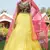 Yellow metallic foil printed net Semi Stitched bridal lehenga