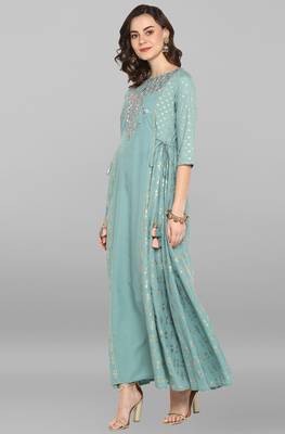 Green printed polyester party wear kurtis 1