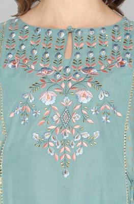 Green printed polyester party wear kurtis 4