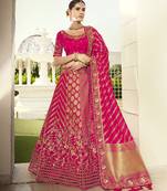 Rani-pink embroidered silk semi stitched lehenga