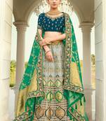 Grey embroidered silk semi stitched lehenga