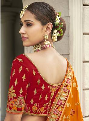 Orange embroidered silk semi stitched lehenga 3
