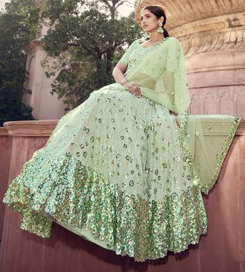 Light-green Thread and sequins embroidered net semi stitched bridal lehenga 4