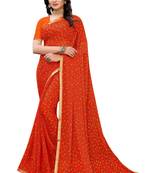 Orange printed chiffon saree with blouse
