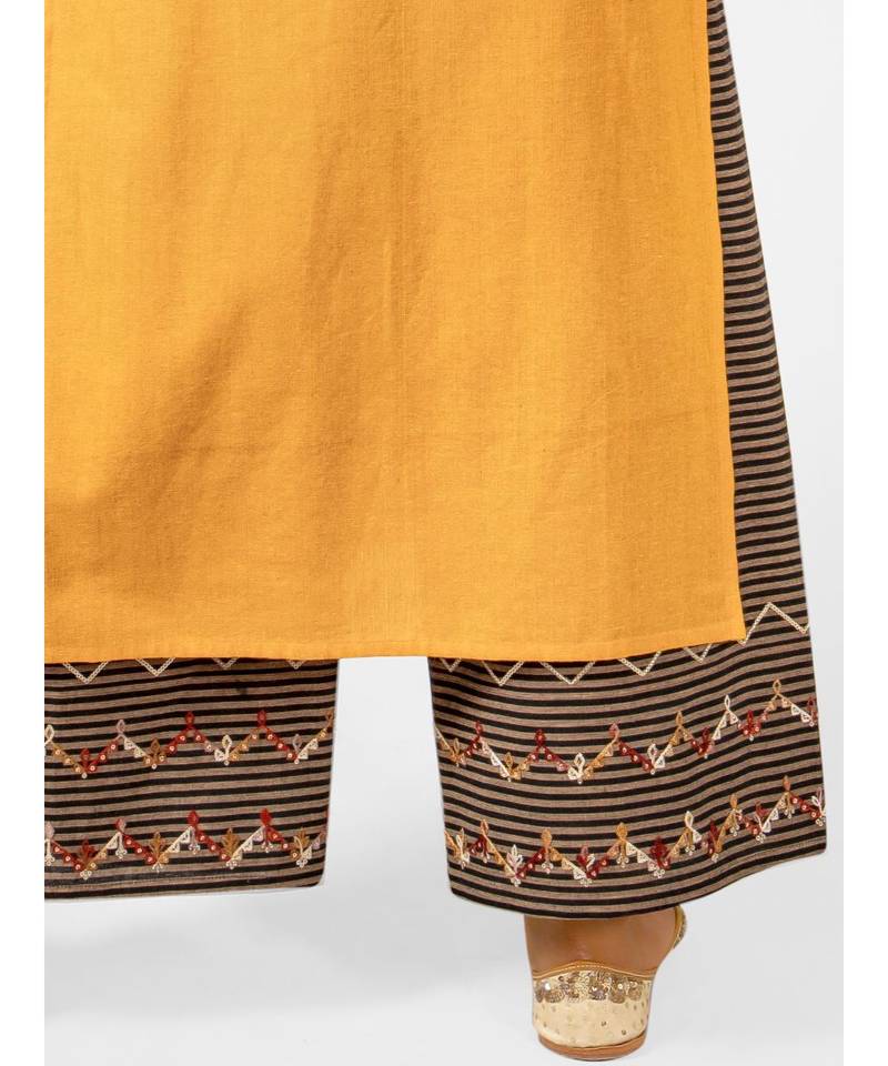 Mustured yellow princes line kurta with black lining palazzo straight bottom