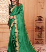 Green embroidered silk blend saree with blouse