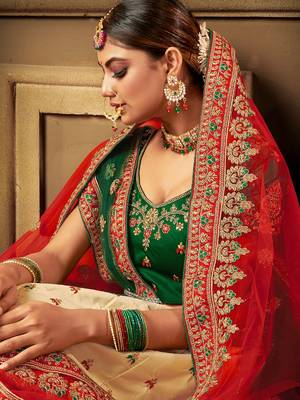 Cream embroidered satin semi stitched lehenga 4