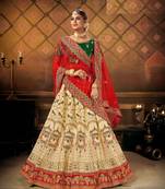 Cream embroidered satin semi stitched lehenga