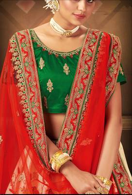 Cream embroidered satin semi stitched lehenga 2