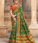 Green embroidered silk saree with blouse
