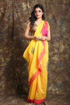 Yellow woven blended cotton saree with pink border and blouse