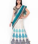 Off white embroidered net saree with blouse